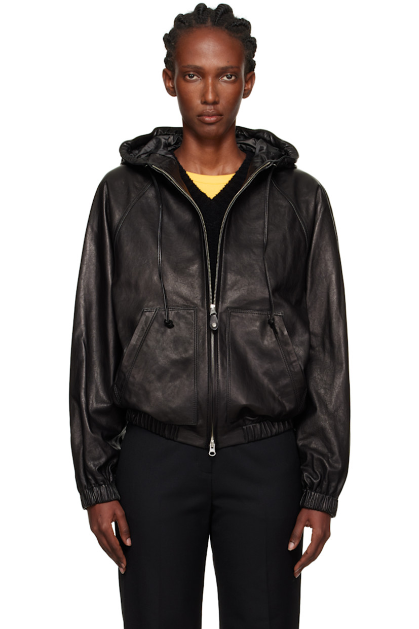Grained lambskin jacket.

· Drawstring at hood
· Two-way zip closure
· Patch pockets at waist
· Elasticized hem and cuffs
· Raglan sleeves
· Full satin lining

Supplier color: Black