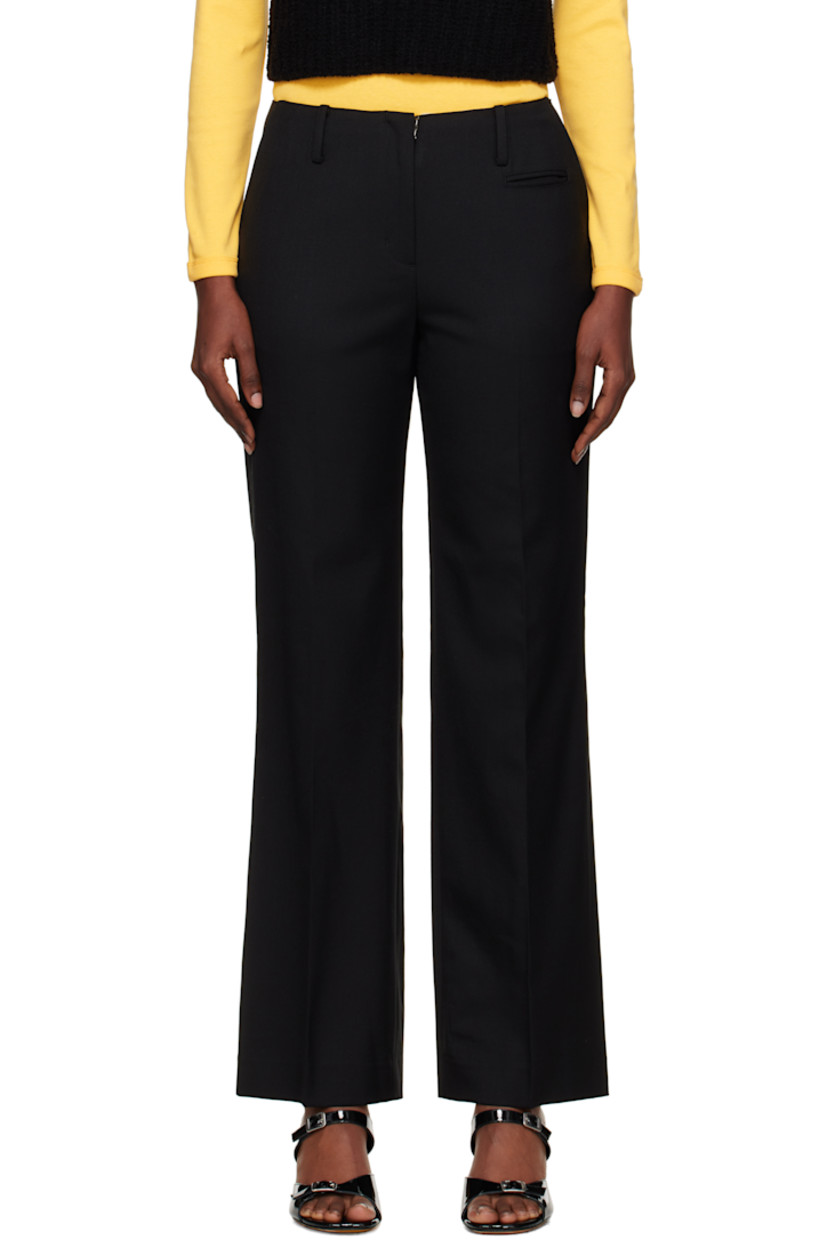 Wool-blend gabardine trousers.

· Slim-fit, straight-leg
· Low-rise
· Belt loops
· Five-pocket styling
· Zip fly
· Central crease at legs
· Full satin lining

Supplier color: Black
