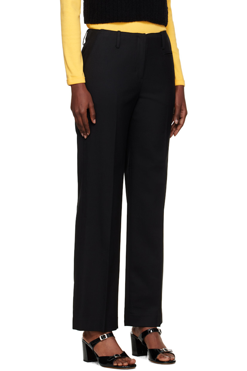 Wool-blend gabardine trousers.

· Slim-fit, straight-leg
· Low-rise
· Belt loops
· Five-pocket styling
· Zip fly
· Central crease at legs
· Full satin lining

Supplier color: Black