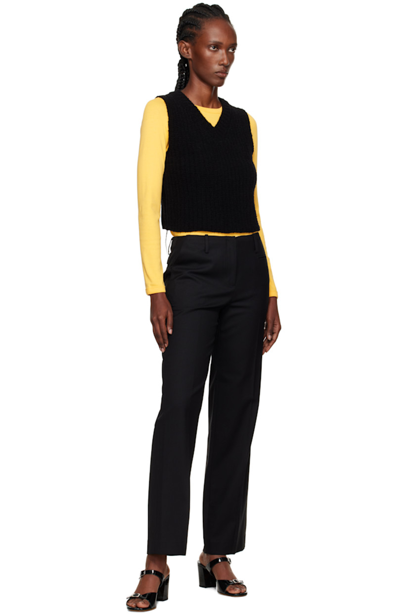 Wool-blend gabardine trousers.

· Slim-fit, straight-leg
· Low-rise
· Belt loops
· Five-pocket styling
· Zip fly
· Central crease at legs
· Full satin lining

Supplier color: Black