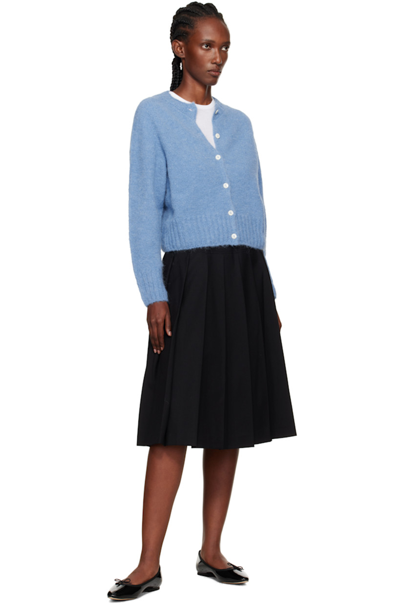 Wool-blend flannel midi skirt.

· Pleats throughout
· Two-pocket styling
· Button fastening and zip closure at side seam
· Full satin lining

Supplier color: Black
