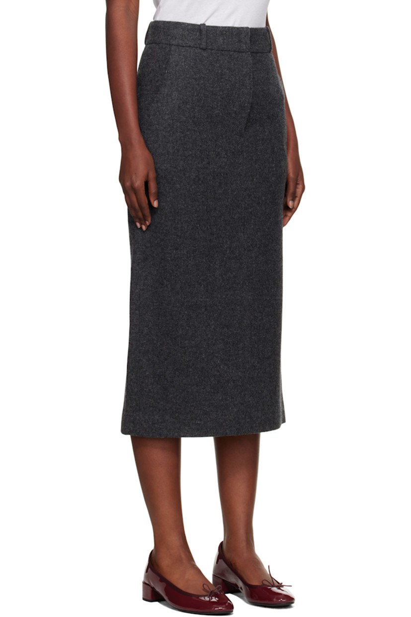 Wool flannel midi skirt.

· Belt loops
· Four-pocket styling
· Zip fly
· Vented back hem
· Full satin lining

Supplier color: Dark Gray