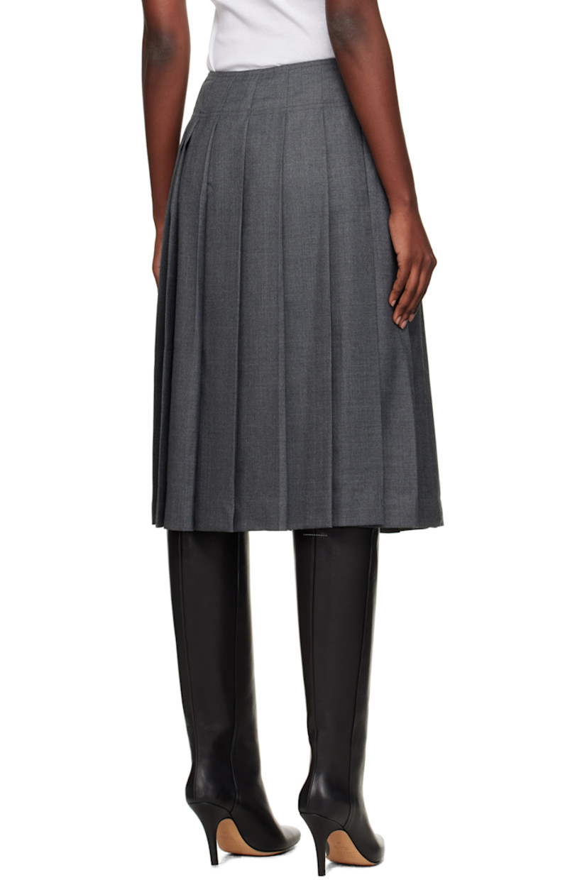 Wool-blend flannel midi skirt.

· Pleats throughout
· Two-pocket styling
· Button fastening and zip closure at side seam
· Full satin lining

Supplier color: Gray