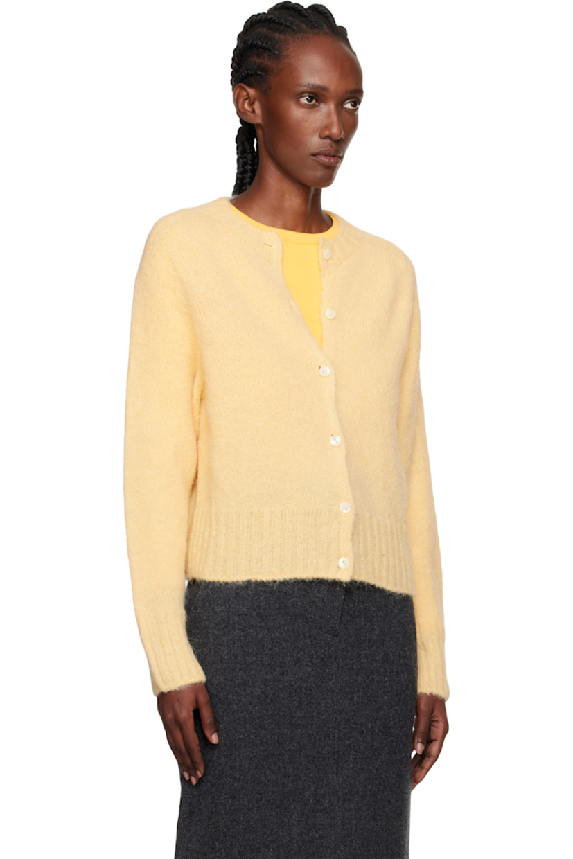 Brushed knit stretch alpaca-blend cardigan.

· Rib-knit round neck, hem, and cuffs
· Button closure

Supplier color: Egg