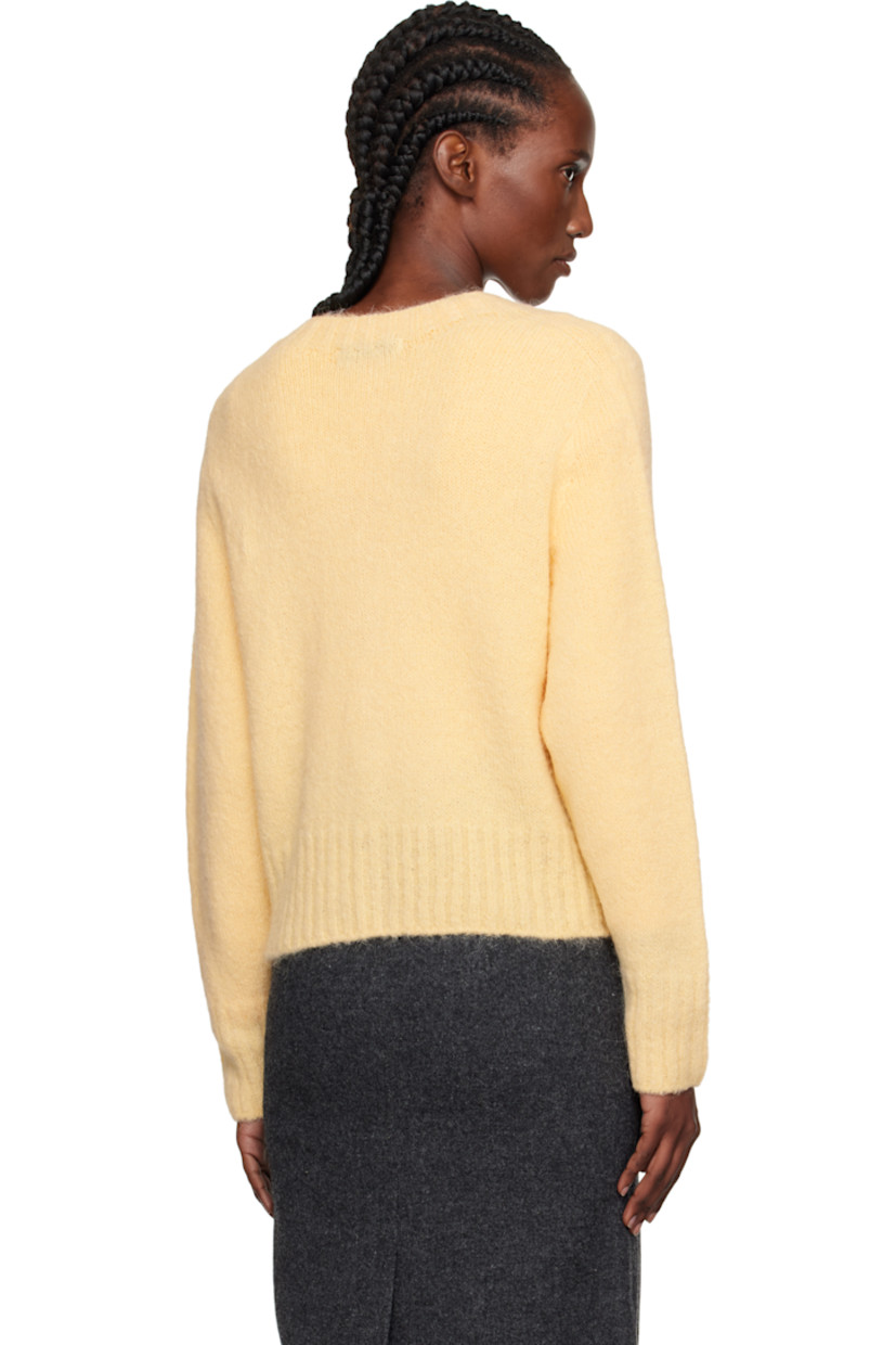 Brushed knit stretch alpaca-blend cardigan.

· Rib-knit round neck, hem, and cuffs
· Button closure

Supplier color: Egg