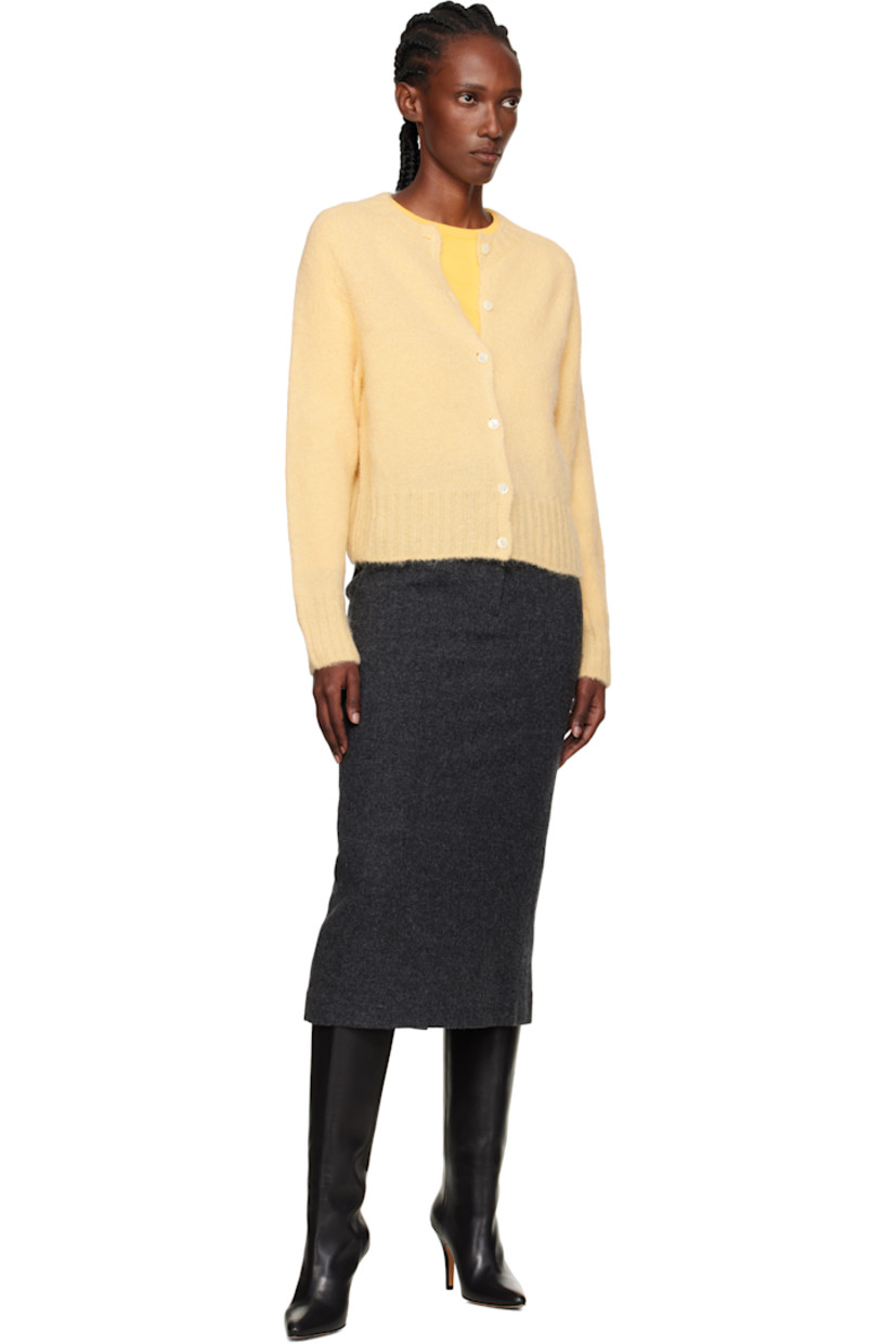 Brushed knit stretch alpaca-blend cardigan.

· Rib-knit round neck, hem, and cuffs
· Button closure

Supplier color: Egg