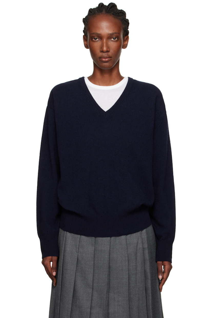 Knit wool-blend sweater.

· Rib-knit V-neck, hem, and cuffs
· Dropped shoulders

Supplier color: Navy