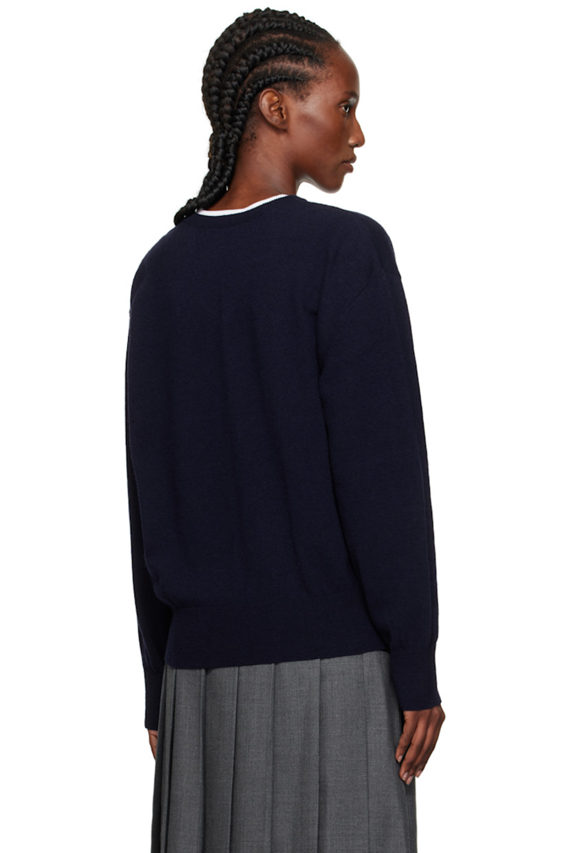 Knit wool-blend sweater.

· Rib-knit V-neck, hem, and cuffs
· Dropped shoulders

Supplier color: Navy