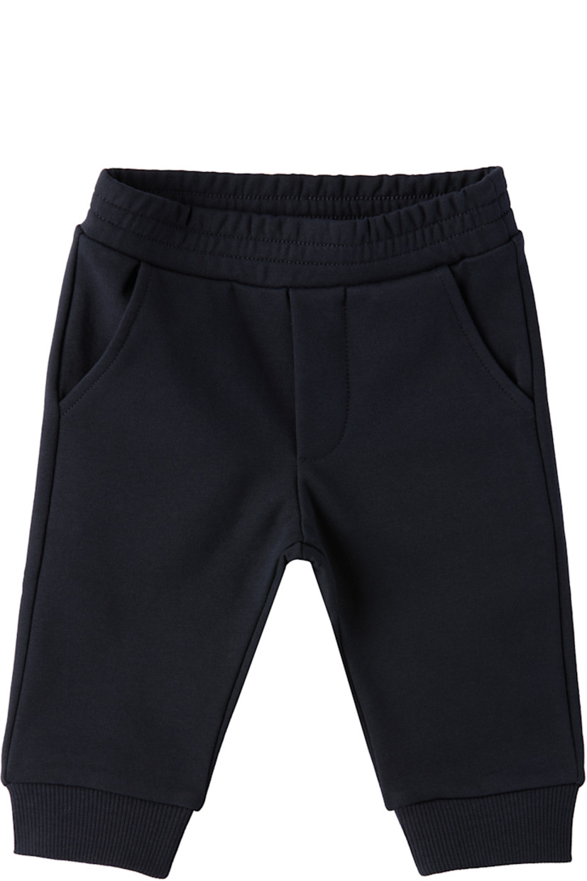 Stretch cotton fleece hoodie. 

· Tricolor rib-knit trim at hood
· Zip closure 
· Patch pockets at waist
· Rib-knit hem and cuffs
· Tricolor logo patch at sleeve

Stretch cotton fleece sweatpants.

· Elasticized waistband
· Two-pocket styling
· Mock fly 
· Rib-knit cuffs
· Logo flag at back waistband 

Supplier color: Navy blue 

Moncler Enfant Size: child's height
1-3M: 21.7" / 55 cm
3-6M: 24.4" / 62 cm
6-9M: 26.7" / 68 cm
9-12M: 29.9" / 76 cm
12-18M: 31.4" / 80 cm 
18-24M: 33.9" / 86 cm
2Y: 36.2" / 92 cm
3Y: 39.4" / 100 cm
