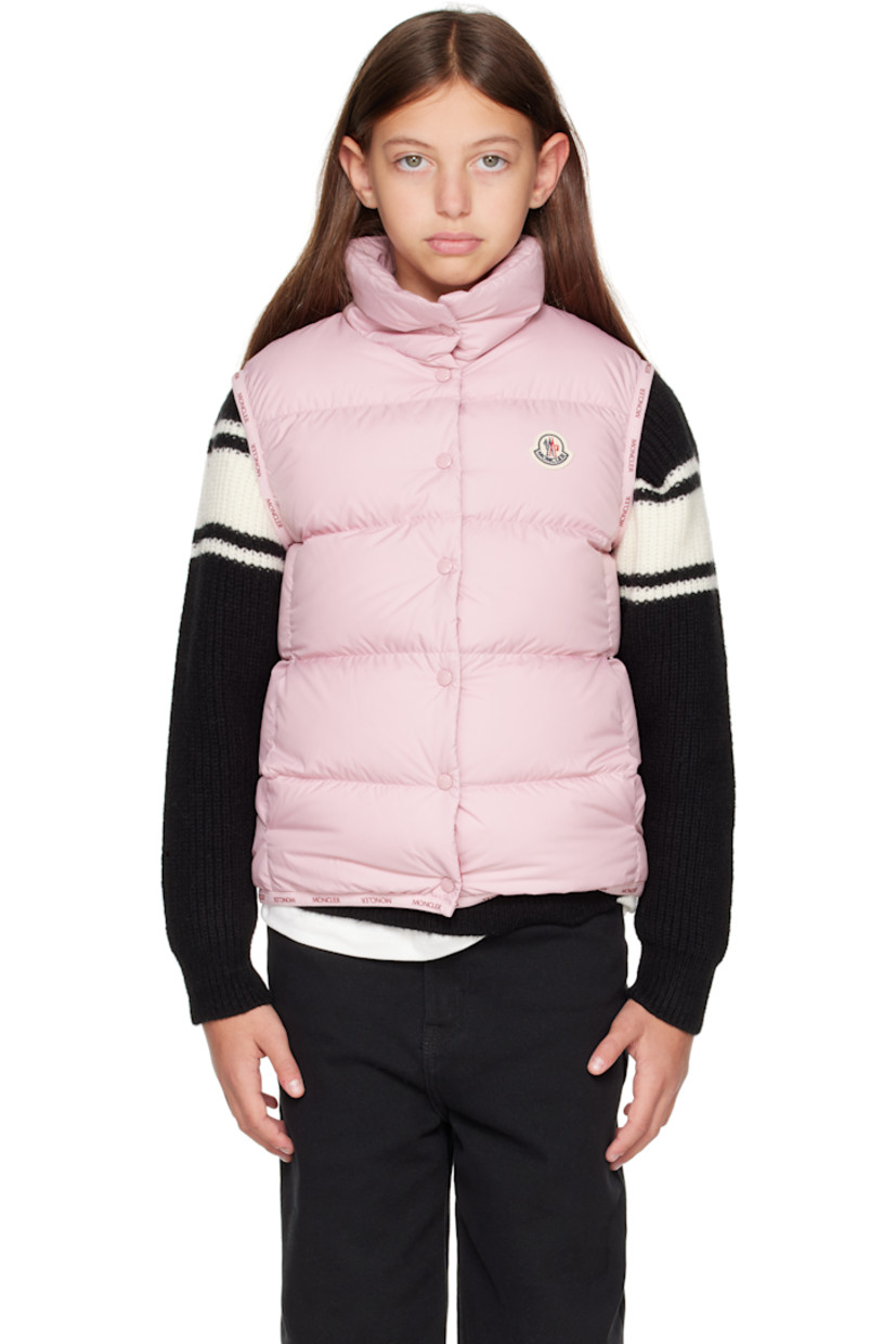 Down-filled and quilted satin vest.

· DIST-certified down
· Stand collar
· Zip closure
· Felted logo patch at chest
· Seam pockets
· Logo-bonded elasticized trim at hem and armscyes
· Fully lined

Supplier color: Pink

Model measures 55" / 139.7 cm tall and wears size 12Y.

Moncler Enfant Size: child's height
8Y: 51.2" / 130 cm 
10Y: 55.2" / 140 cm 
12Y: 59.8" / 152 cm 
14Y: 64.6" / 164 cm