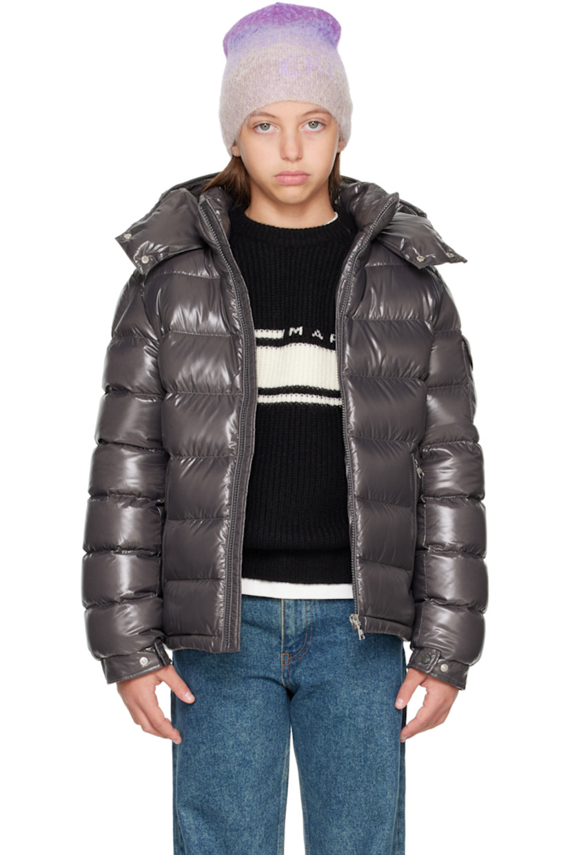 Down-filled and quilted nylon laqué jacket.

· DIST-certified down
· Detachable hood at stand collar
· Zip closure
· Zip pockets at front
· Flap pocket and felted logo patch at sleeve
· Adjustable press-stud fastening at elasticized cuffs
· Fully lined

Supplier color: Grey

Model measures 55" / 139.7 cm tall and wears size 12Y.

Moncler Enfant Size: child's height
8Y: 51.2" / 130 cm 
10Y: 55.2" / 140 cm 
12Y: 59.8" / 152 cm 
14Y: 64.6" / 164 cm