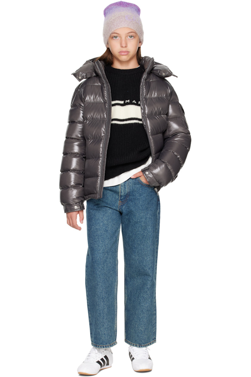 Down-filled and quilted nylon laqué jacket.

· DIST-certified down
· Detachable hood at stand collar
· Zip closure
· Zip pockets at front
· Flap pocket and felted logo patch at sleeve
· Adjustable press-stud fastening at elasticized cuffs
· Fully lined

Supplier color: Grey

Model measures 55" / 139.7 cm tall and wears size 12Y.

Moncler Enfant Size: child's height
8Y: 51.2" / 130 cm 
10Y: 55.2" / 140 cm 
12Y: 59.8" / 152 cm 
14Y: 64.6" / 164 cm
