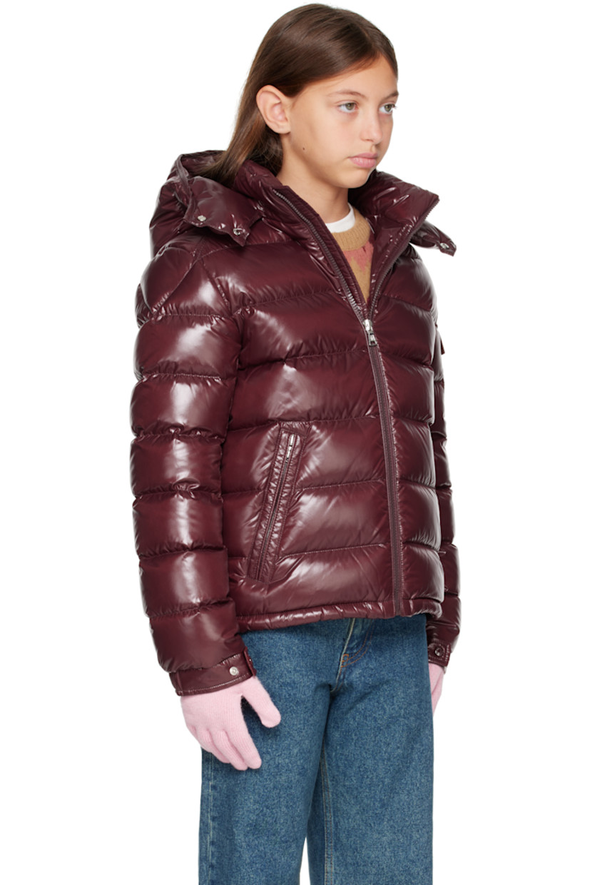 Down-filled and quilted nylon laqué jacket.

· DIST-certified down
· Detachable hood at stand collar
· Zip closure
· Zip pockets at front
· Flap pocket and felted logo patch at sleeve
· Adjustable press-stud fastening at elasticized cuffs
· Fully lined

Supplier color: Bordeaux

Model measures 55" / 139.7 cm tall and wears size 12Y.

Moncler Enfant Size: child's height
8Y: 51.2" / 130 cm 
10Y: 55.2" / 140 cm 
12Y: 59.8" / 152 cm 
14Y: 64.6" / 164 cm