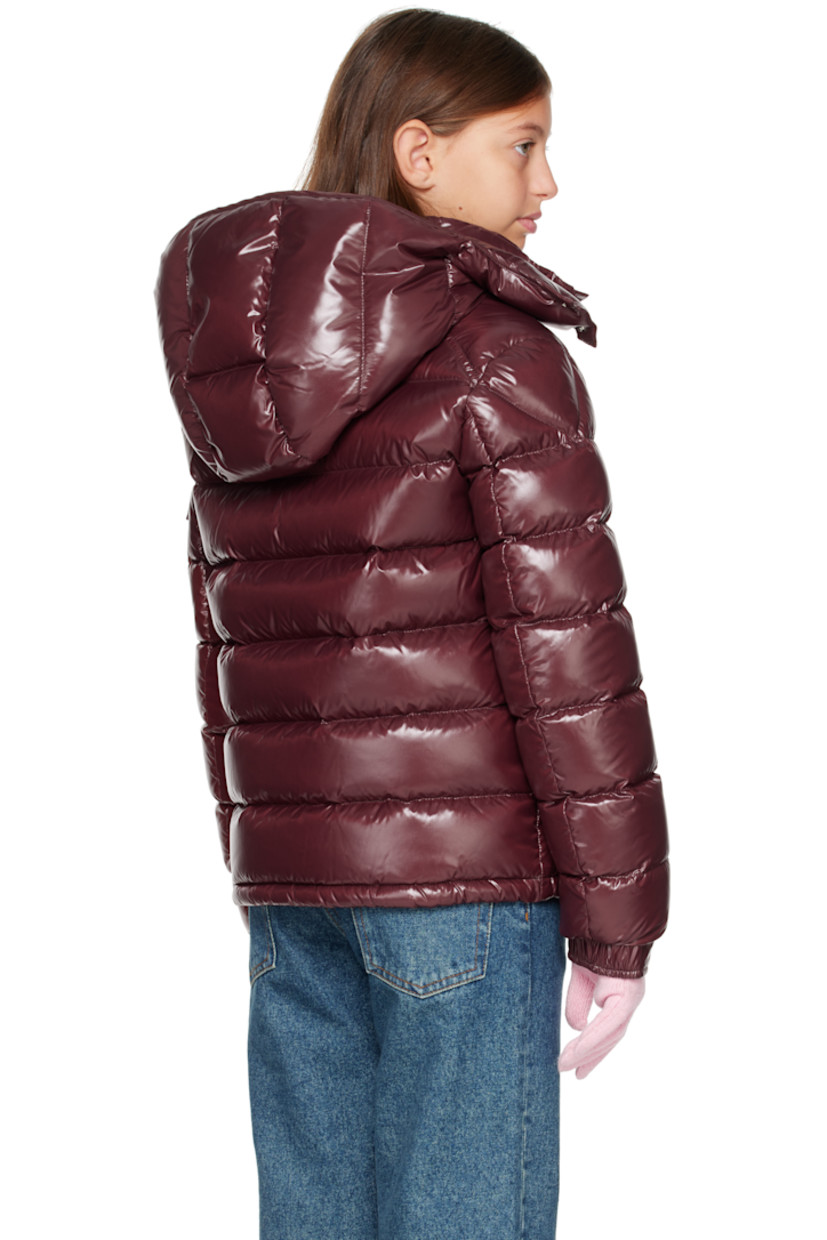 Down-filled and quilted nylon laqué jacket.

· DIST-certified down
· Detachable hood at stand collar
· Zip closure
· Zip pockets at front
· Flap pocket and felted logo patch at sleeve
· Adjustable press-stud fastening at elasticized cuffs
· Fully lined

Supplier color: Bordeaux

Model measures 55" / 139.7 cm tall and wears size 12Y.

Moncler Enfant Size: child's height
8Y: 51.2" / 130 cm 
10Y: 55.2" / 140 cm 
12Y: 59.8" / 152 cm 
14Y: 64.6" / 164 cm