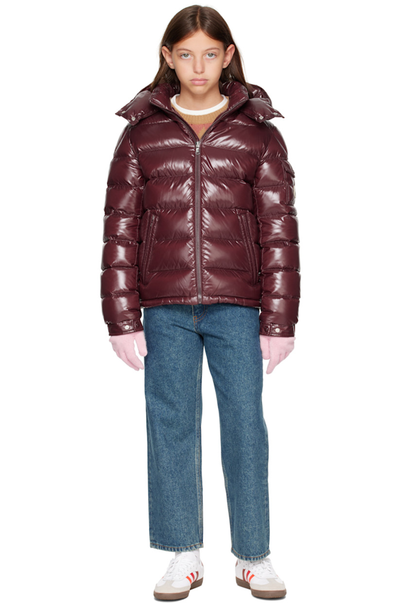 Down-filled and quilted nylon laqué jacket.

· DIST-certified down
· Detachable hood at stand collar
· Zip closure
· Zip pockets at front
· Flap pocket and felted logo patch at sleeve
· Adjustable press-stud fastening at elasticized cuffs
· Fully lined

Supplier color: Bordeaux

Model measures 55" / 139.7 cm tall and wears size 12Y.

Moncler Enfant Size: child's height
8Y: 51.2" / 130 cm 
10Y: 55.2" / 140 cm 
12Y: 59.8" / 152 cm 
14Y: 64.6" / 164 cm