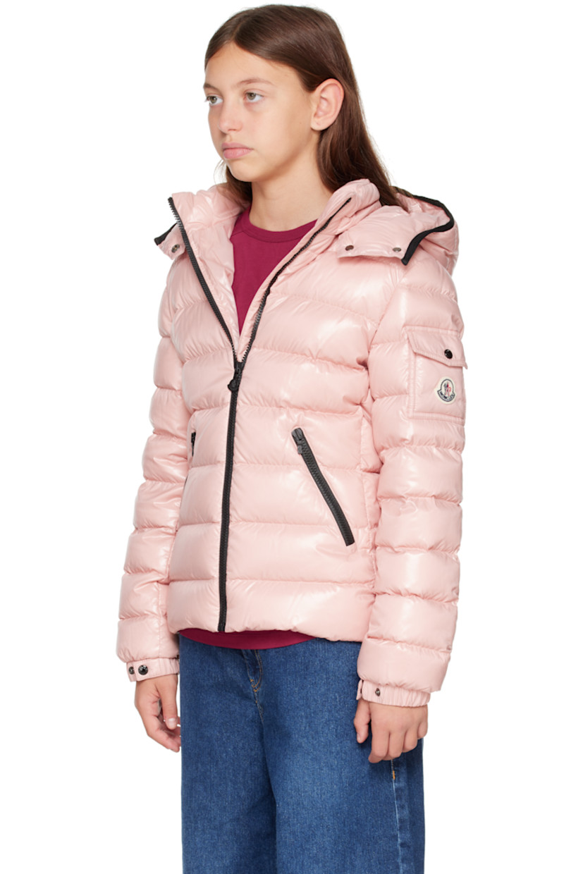 Down-filled and quilted nylon laqué jacket.

· DIST-certified down
· Detachable hood at stand collar
· Zip closure
· Zip pockets at front
· Flap pocket and felted logo patch at sleeve
· Adjustable press-stud fastening at elasticized cuffs
· Fully lined

Supplier color: Light pink

Model measures 55" / 139.7 cm tall and wears size 12Y.

Moncler Enfant Size: child's height
8Y: 51.2" / 130 cm 
10Y: 55.2" / 140 cm 
12Y: 59.8" / 152 cm 
14Y: 64.6" / 164 cm