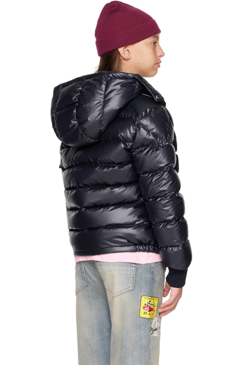 Down-filled and quilted satin jacket.

· DIST-certified down
· Detachable hood at stand collar
· Zip closure with press-stud placket
· Welt pockets at front
· Elasticized hem
· Flap pocket and felted logo patch at sleeve
· Rib-knit cuffs
· Fully lined

Supplier color: Blue navy

Model measures 55" / 139.7 cm tall and wears size 12Y.

Moncler Enfant Size: child's height
8Y: 51.2" / 130 cm 
10Y: 55.2" / 140 cm 
12Y: 59.8" / 152 cm 
14Y: 64.6" / 164 cm