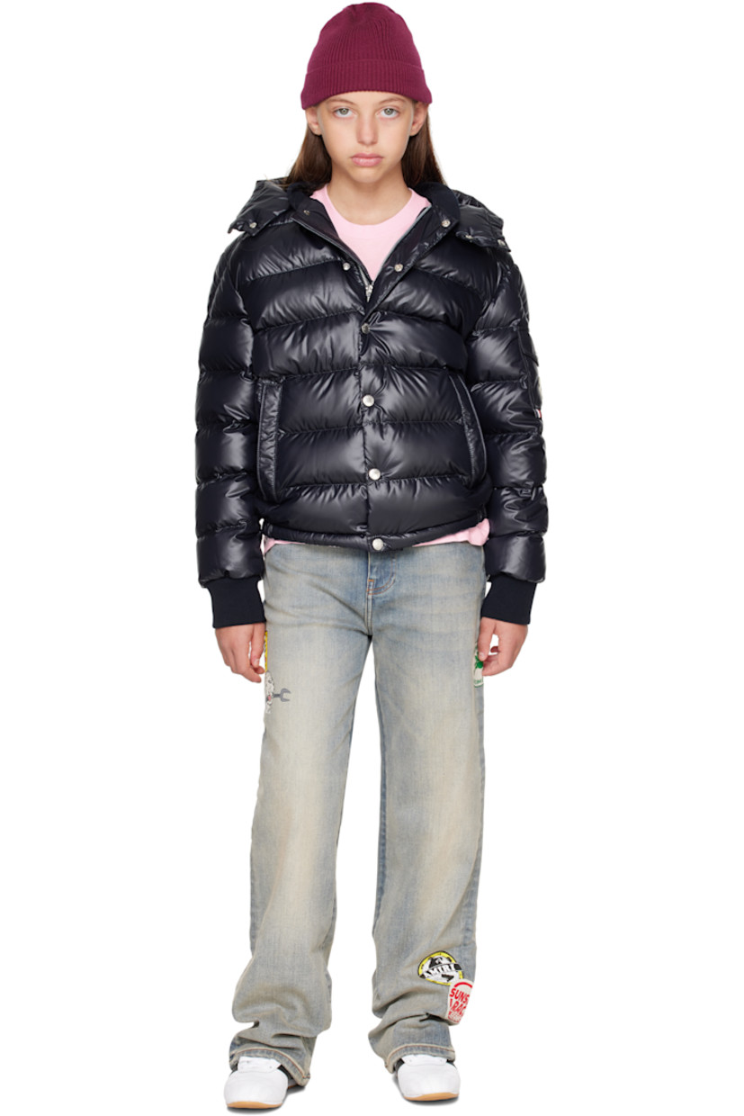 Down-filled and quilted satin jacket.

· DIST-certified down
· Detachable hood at stand collar
· Zip closure with press-stud placket
· Welt pockets at front
· Elasticized hem
· Flap pocket and felted logo patch at sleeve
· Rib-knit cuffs
· Fully lined

Supplier color: Blue navy

Model measures 55" / 139.7 cm tall and wears size 12Y.

Moncler Enfant Size: child's height
8Y: 51.2" / 130 cm 
10Y: 55.2" / 140 cm 
12Y: 59.8" / 152 cm 
14Y: 64.6" / 164 cm