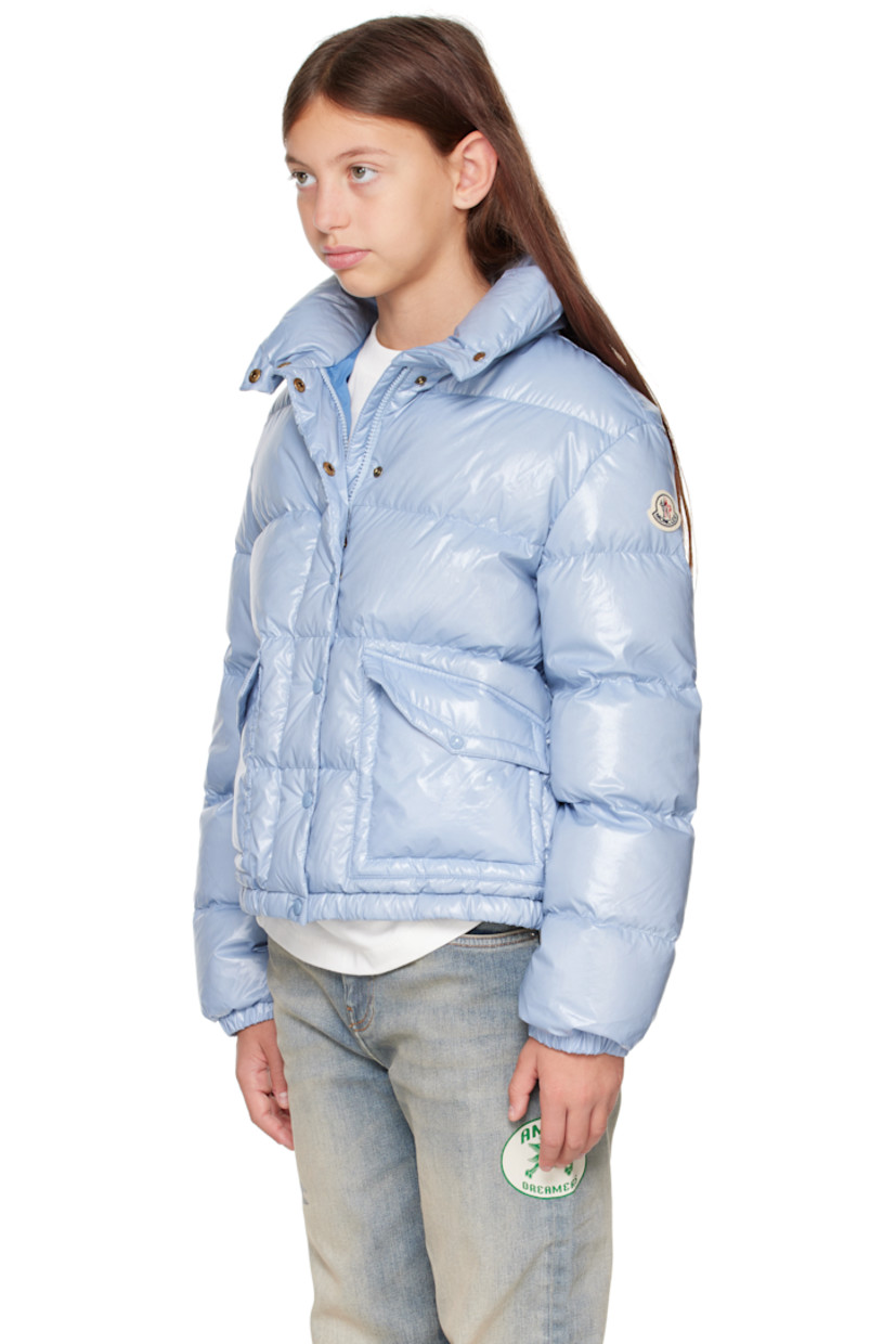 Down-filled and quilted nylon satin jacket.

· DIST-certified down
· Funnel neck
· Zip closure with press-stud placket
· Flap pockets at front
· Elasticized hem and cuffs
· Felted logo patch at sleeve
· Fully lined

Supplier color: Light blue

Model measures 55" / 139.7 cm tall and wears size 12Y.

Moncler Enfant Size: child's height
8Y: 51.2" / 130 cm 
10Y: 55.2" / 140 cm 
12Y: 59.8" / 152 cm 
14Y: 64.6" / 164 cm