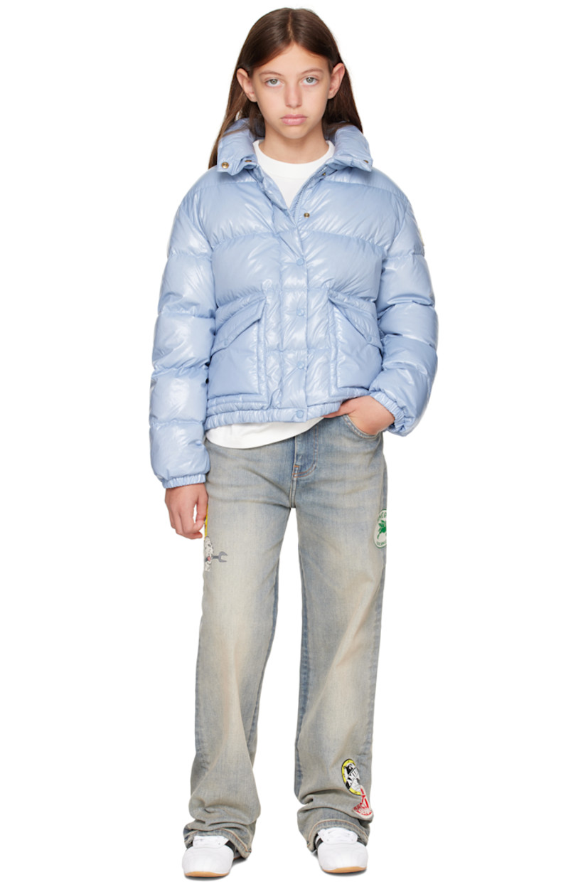 Down-filled and quilted nylon satin jacket.

· DIST-certified down
· Funnel neck
· Zip closure with press-stud placket
· Flap pockets at front
· Elasticized hem and cuffs
· Felted logo patch at sleeve
· Fully lined

Supplier color: Light blue

Model measures 55" / 139.7 cm tall and wears size 12Y.

Moncler Enfant Size: child's height
8Y: 51.2" / 130 cm 
10Y: 55.2" / 140 cm 
12Y: 59.8" / 152 cm 
14Y: 64.6" / 164 cm