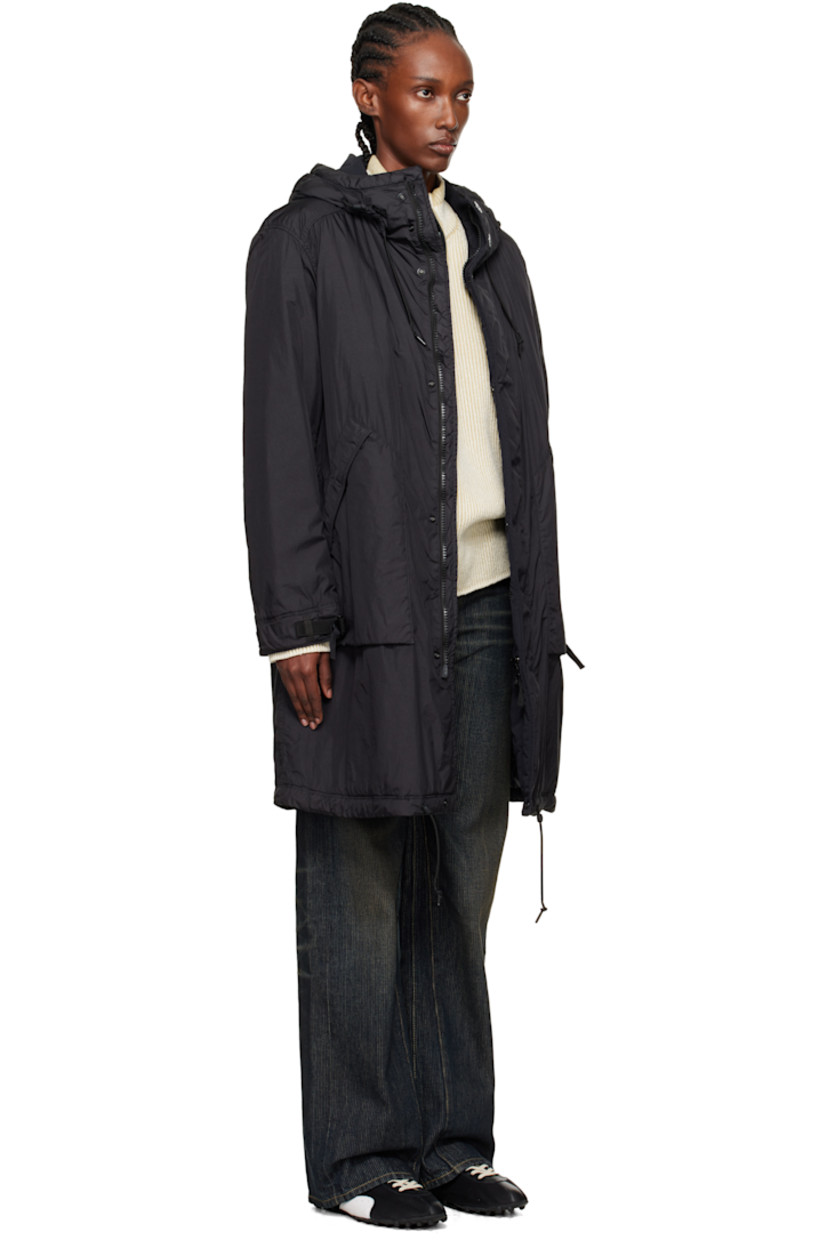 PrimaLoft®-TC-insulated nylon taffeta coat.

· Water-resistant anti-drop coating
· Garment-dyed
· Cord-lock drawstring at hood
· Two-way zip closure with press-stud placket
· Zip pockets at front
· Cord-lock drawstring at hem
· Detachable felted logo patch at sleeve
· Cinch strap at cuffs
· Full quilted satin lining

Supplier color: Black