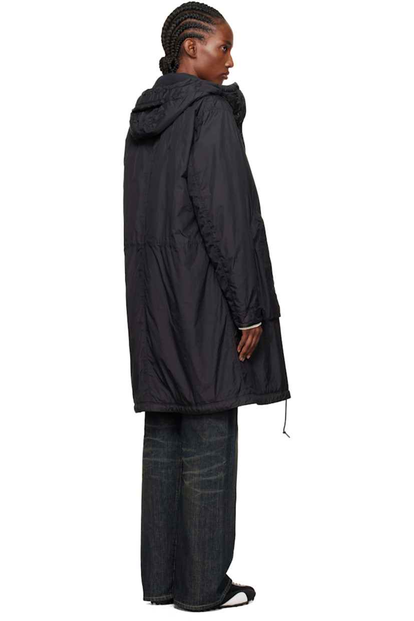PrimaLoft®-TC-insulated nylon taffeta coat.

· Water-resistant anti-drop coating
· Garment-dyed
· Cord-lock drawstring at hood
· Two-way zip closure with press-stud placket
· Zip pockets at front
· Cord-lock drawstring at hem
· Detachable felted logo patch at sleeve
· Cinch strap at cuffs
· Full quilted satin lining

Supplier color: Black