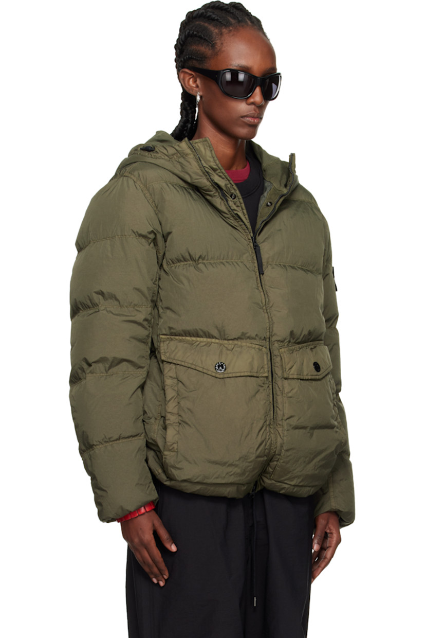 Down-filled crinkled recycled nylon taffeta jacket.

· Wind-resistant and water-resistant 
· Garment-dyed and anti-drop coated
· RDS-certified down
· Bungee-style drawstring at hood
· Two-way zip closure with press-stud placket
· Flap pockets and welt pockets
· Concealed bungee-style drawstring at hem
· Detachable felted logo patch at sleeve
· Inset elasticized cuffs
· Patch pocket at interior
· Resin-coated taffeta lining

Supplier color: Military green

Fill: 80% duck down, 20% duck feather.