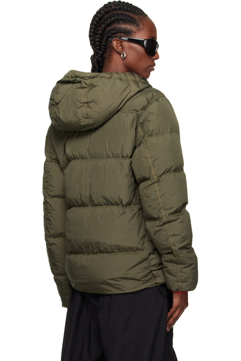 Down-filled crinkled recycled nylon taffeta jacket.

· Wind-resistant and water-resistant 
· Garment-dyed and anti-drop coated
· RDS-certified down
· Bungee-style drawstring at hood
· Two-way zip closure with press-stud placket
· Flap pockets and welt pockets
· Concealed bungee-style drawstring at hem
· Detachable felted logo patch at sleeve
· Inset elasticized cuffs
· Patch pocket at interior
· Resin-coated taffeta lining

Supplier color: Military green

Fill: 80% duck down, 20% duck feather.