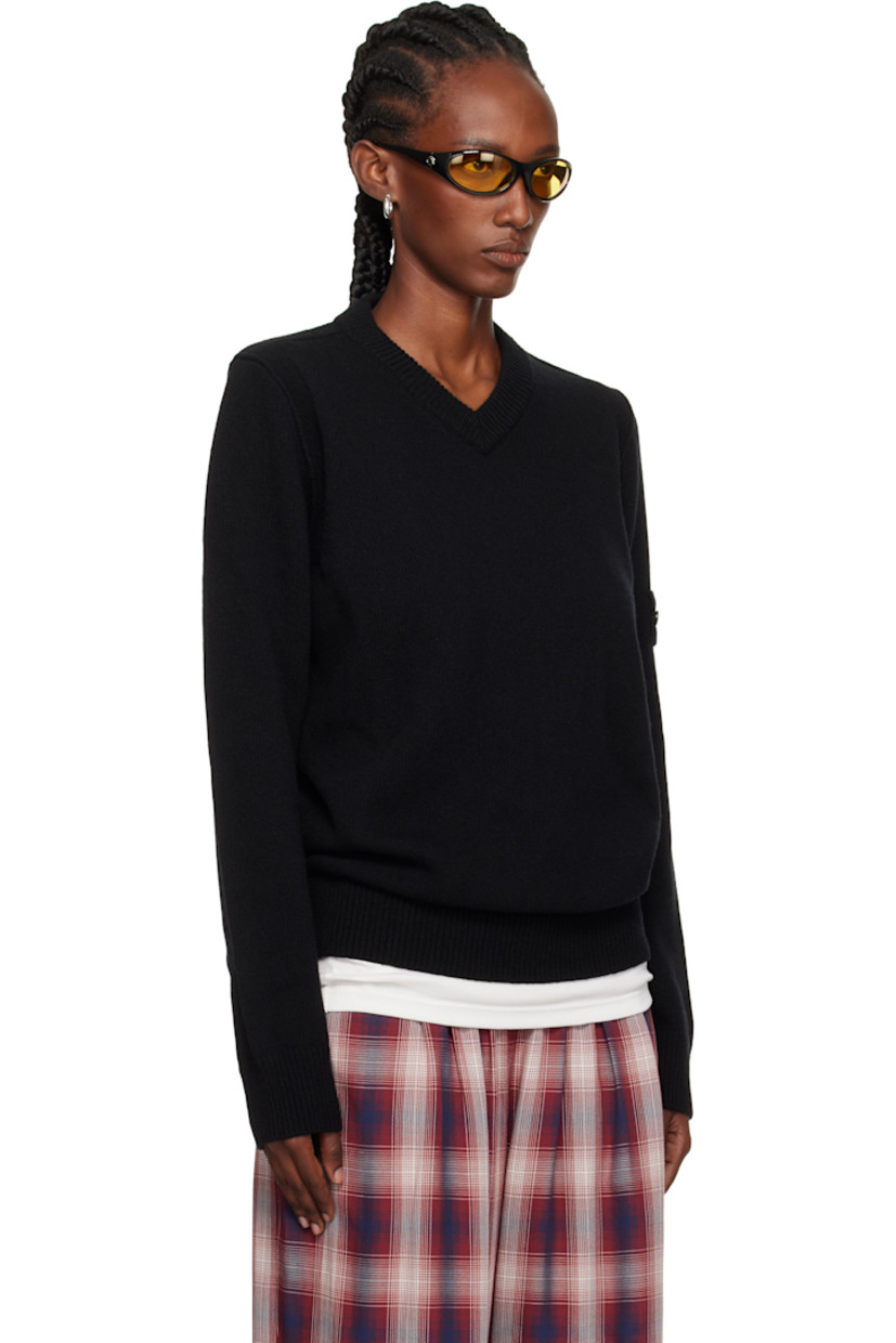 Knit wool-blend sweater.

· Rib-knit V-neck, hem, and cuffs
· Detachable felted logo patch at sleeve

Supplier color: Black