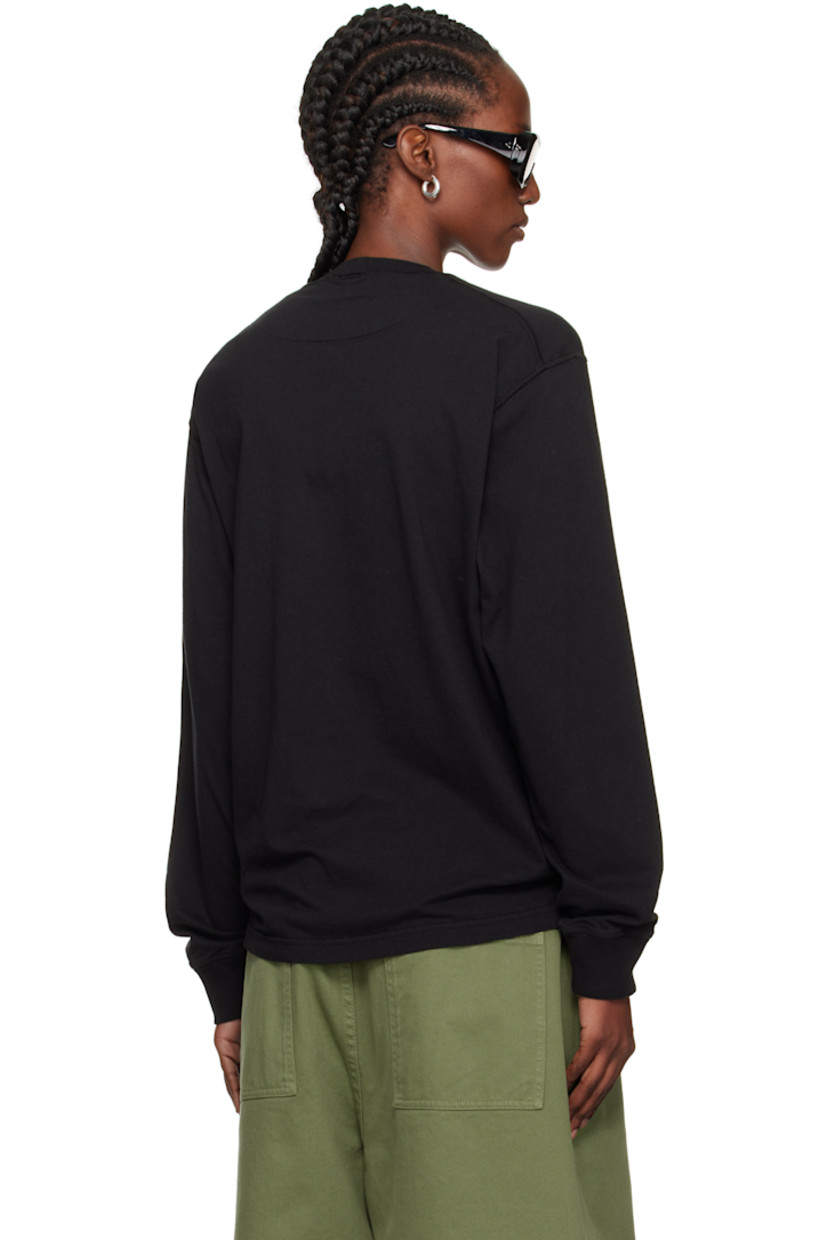 Slim-fit organic cotton jersey T-shirt.

· Overlock stitching throughout
· Garment-dyed
· Rib-knit crewneck and cuffs
· Logo patch at chest

Supplier color: Black