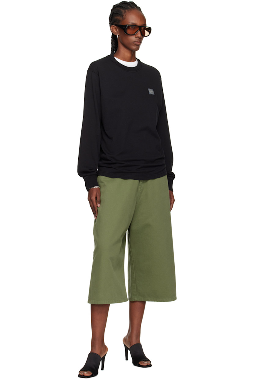 Slim-fit organic cotton jersey T-shirt.

· Overlock stitching throughout
· Garment-dyed
· Rib-knit crewneck and cuffs
· Logo patch at chest

Supplier color: Black