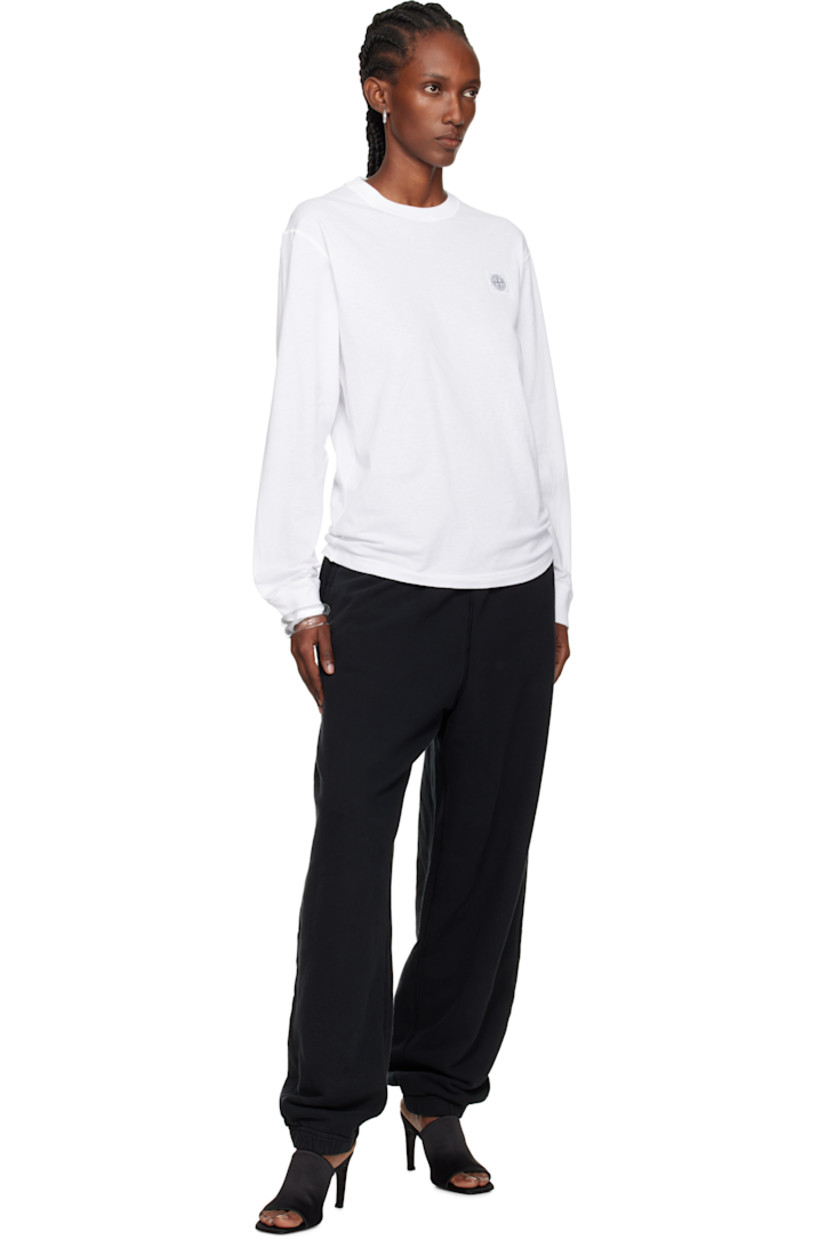 Slim-fit organic cotton jersey T-shirt.

· Overlock stitching throughout
· Garment-dyed
· Rib-knit crewneck and cuffs
· Logo patch at chest

Supplier color: White