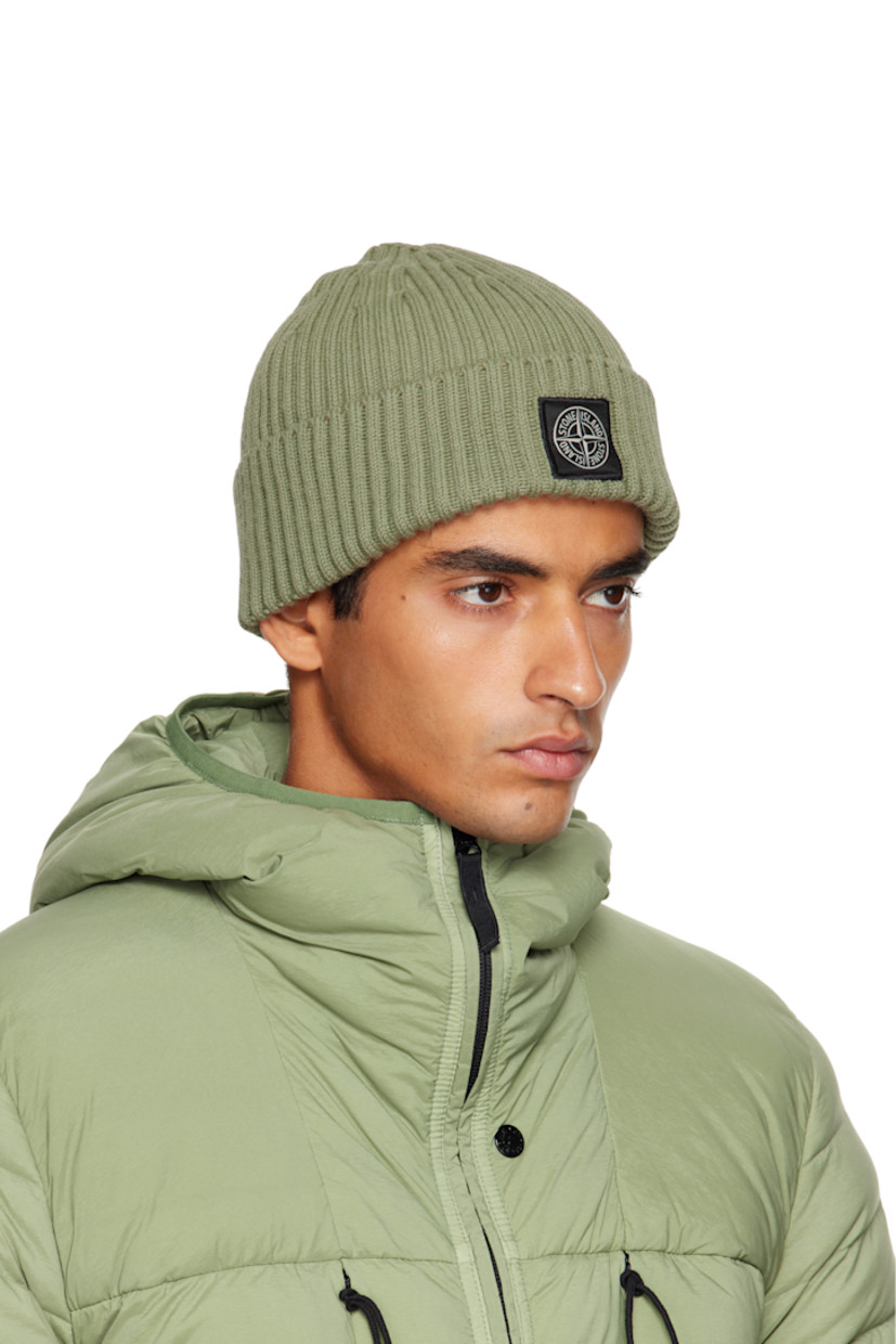 9-gauge rib-knit virgin wool beanie. 

· RWS-certified wool
· Logo patch at face
· Rolled brim 

Supplier color: Sage green
