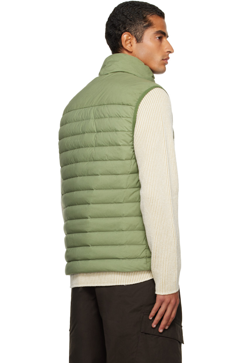 Down-filled and quilted stretch nylon taffeta vest.

· RDS-certified down
· Garment-dyed
· Stand collar
· Two-way zip closure
· Zip pockets at chest and waist
· Bungee-style drawstring at hem
· Detachable felted logo patch at side seam
· Elasticized armscyes
· Fully lined

Supplier color: Sage

Fill: 90% duck down, 10% duck feathers.