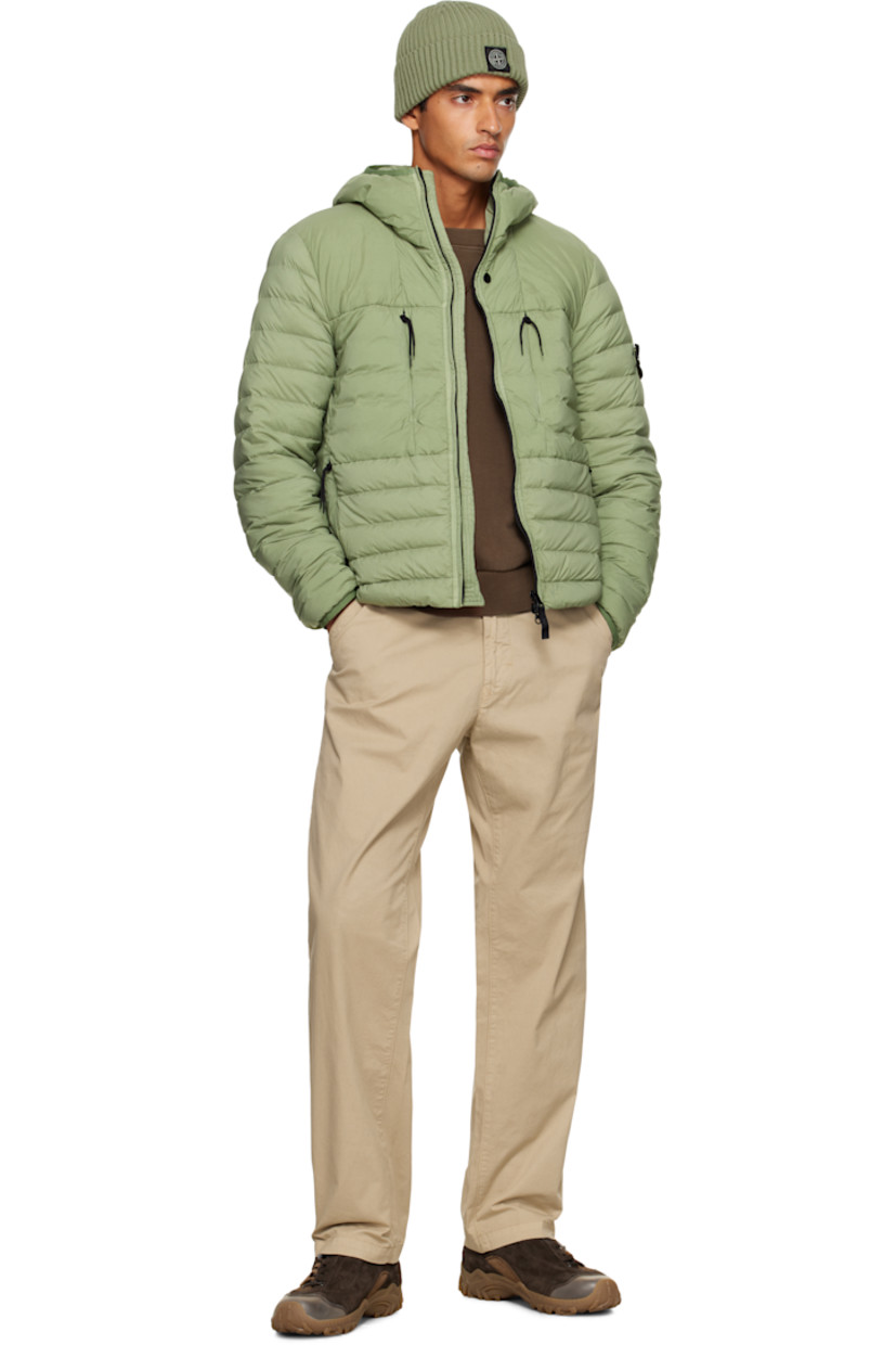 Down-filled and quilted stretch nylon taffeta jacket.

· RDS-certified down
· Garment-dyed
· Elasticized trim at hood and cuffs
· Two-way zip closure
· Zip pockets at chest and waist
· Bungee-style drawstring at hem
· Detachable felted logo patch at sleeve
· Fully lined

Supplier color: Sage

Fill: 90% duck down, 10% duck feather.