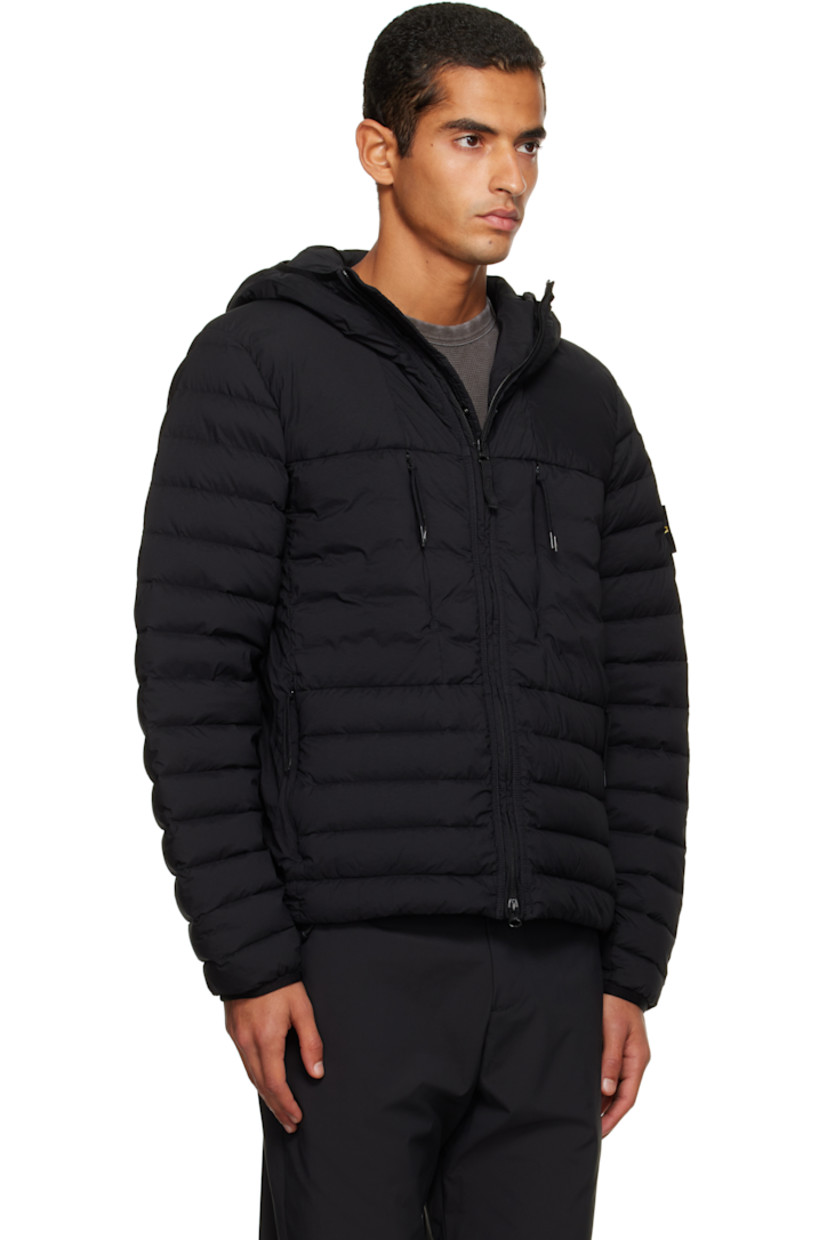 Down-filled and quilted stretch nylon taffeta jacket.

· RDS-certified down
· Garment-dyed
· Elasticized trim at hood and cuffs
· Two-way zip closure
· Zip pockets at chest and waist
· Bungee-style drawstring at hem
· Detachable felted logo patch at sleeve
· Fully lined

Supplier color: Black

Fill: 90% duck down, 10% duck feather.
