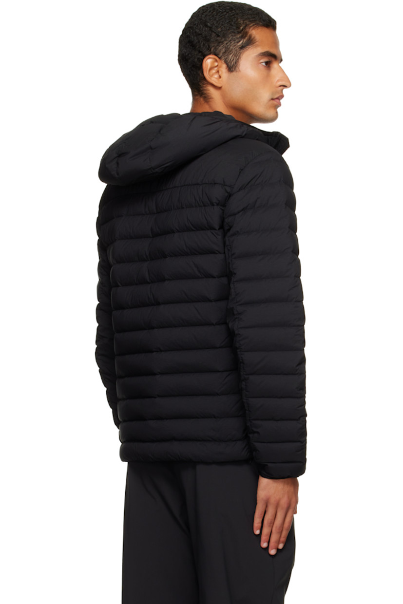 Down-filled and quilted stretch nylon taffeta jacket.

· RDS-certified down
· Garment-dyed
· Elasticized trim at hood and cuffs
· Two-way zip closure
· Zip pockets at chest and waist
· Bungee-style drawstring at hem
· Detachable felted logo patch at sleeve
· Fully lined

Supplier color: Black

Fill: 90% duck down, 10% duck feather.