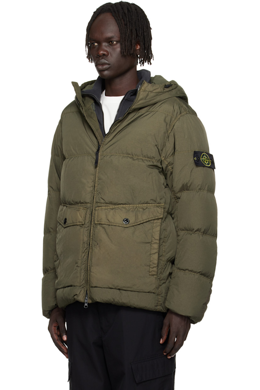 Down-filled and coated crinkled nylon taffeta jacket. 

· RDS-certified down 
· Water-resistant, wind-resistant garment-dyed 
· Bungee-style drawstring at hood and hem 
· Two-way zip and press-stud closure
· Flap and welt pockets at waist
· Detachable felted logo patch st sleeve
· Elasticized cuffs
· Patch pocket at interior 
· Full plain-woven lining 

Supplier color: Military green

Fill 1: 80% duck down, 20% duck feather. Fill 2: 100% polyester.