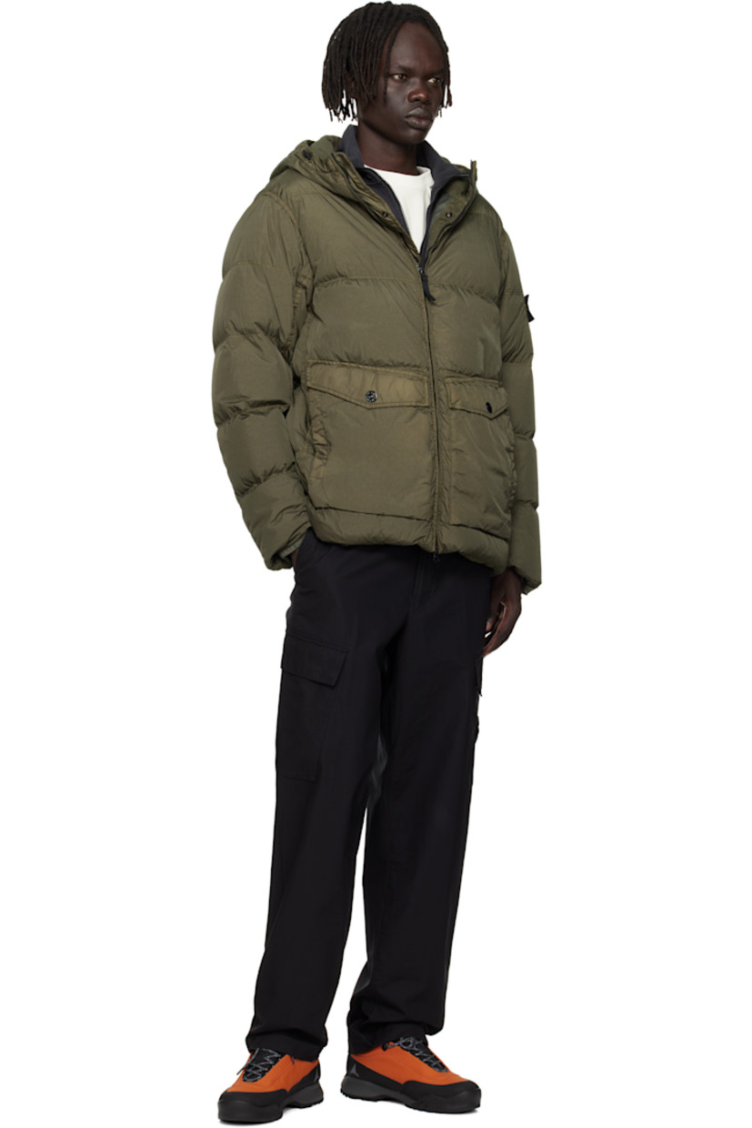 Down-filled and coated crinkled nylon taffeta jacket. 

· RDS-certified down 
· Water-resistant, wind-resistant garment-dyed 
· Bungee-style drawstring at hood and hem 
· Two-way zip and press-stud closure
· Flap and welt pockets at waist
· Detachable felted logo patch st sleeve
· Elasticized cuffs
· Patch pocket at interior 
· Full plain-woven lining 

Supplier color: Military green

Fill 1: 80% duck down, 20% duck feather. Fill 2: 100% polyester.