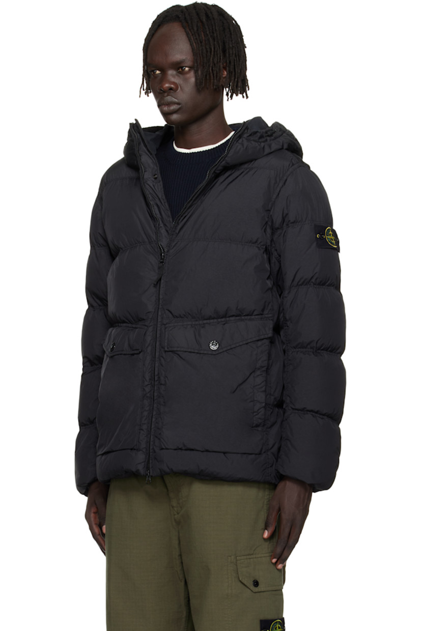 Down-filled and coated crinkled nylon taffeta jacket. 

· RDS-certified down 
· Water-resistant, wind-resistant garment-dyed 
· Bungee-style drawstring at hood and hem 
· Two-way zip and press-stud closure
· Flap and welt pockets at waist
· Detachable felted logo patch at sleeve
· Elasticized cuffs
· Patch pocket at interior 
· Full plain-woven lining 

Supplier color: Black 

Fill 1: 80% duck down, 20% duck feather. Fill 2: 100% polyester.