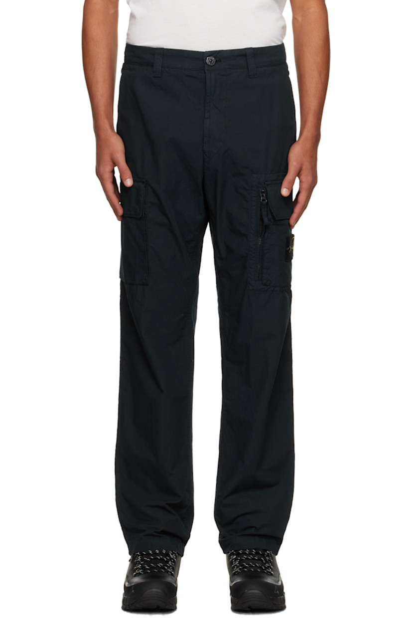 Garment-dyed cotton canvas cargo pants.

· Belt loops
· Three-pocket styling
· Zip fly
· Flap pockets and zip pocket at legs
· Detachable logo patch at leg

Supplier color: Navy blue
