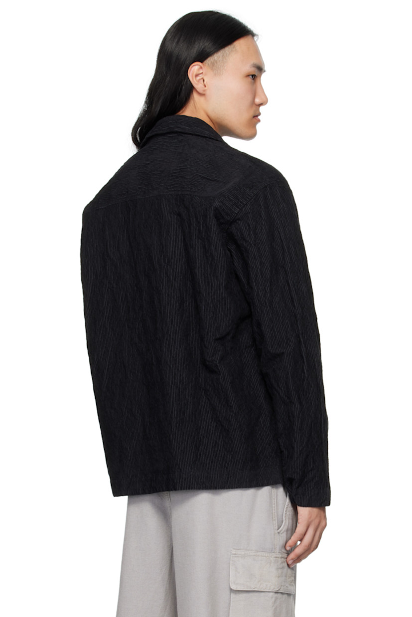 Garment-dyed cotton-blend corduroy jacket.

· Spread collar
· Concealed zip closure with press-stud placket
· Press-stud flap pocket at chest
· Detachable logo patch at sleeve
· Press-stud fastening at cuffs
· Press-stud pocket at interior
· Unlined

Supplier color: Black