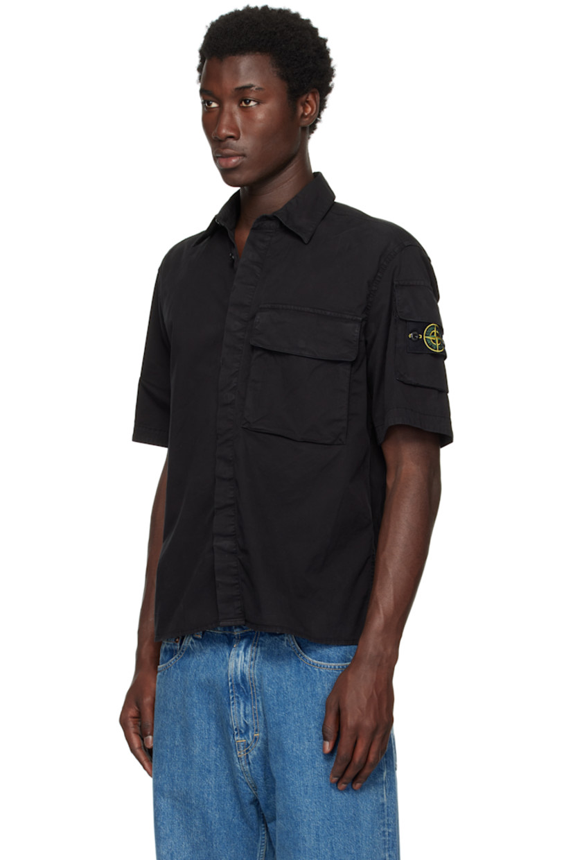 Garment-dyed stretch cotton twill shirt.

· Spread collar
· Button up closure
· Flap pockets at chest and sleeve
· Detachable felted logo patch at sleeve
· Logo-engraved black hardware

Supplier color: Black