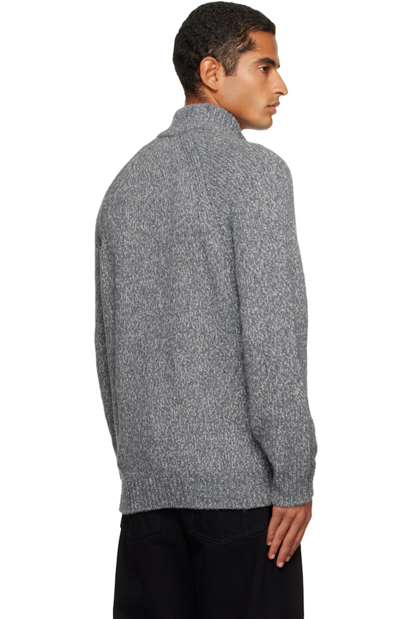 Knit virgin wool-blend cardigan. 

· Rib-knit stand collar, hem, and cuffs
· Two-way zip closure
· Patch pockets at waist
· Raglan sleeves
· Detachable felted logo patch at sleeve

Supplier color: Cement melange
