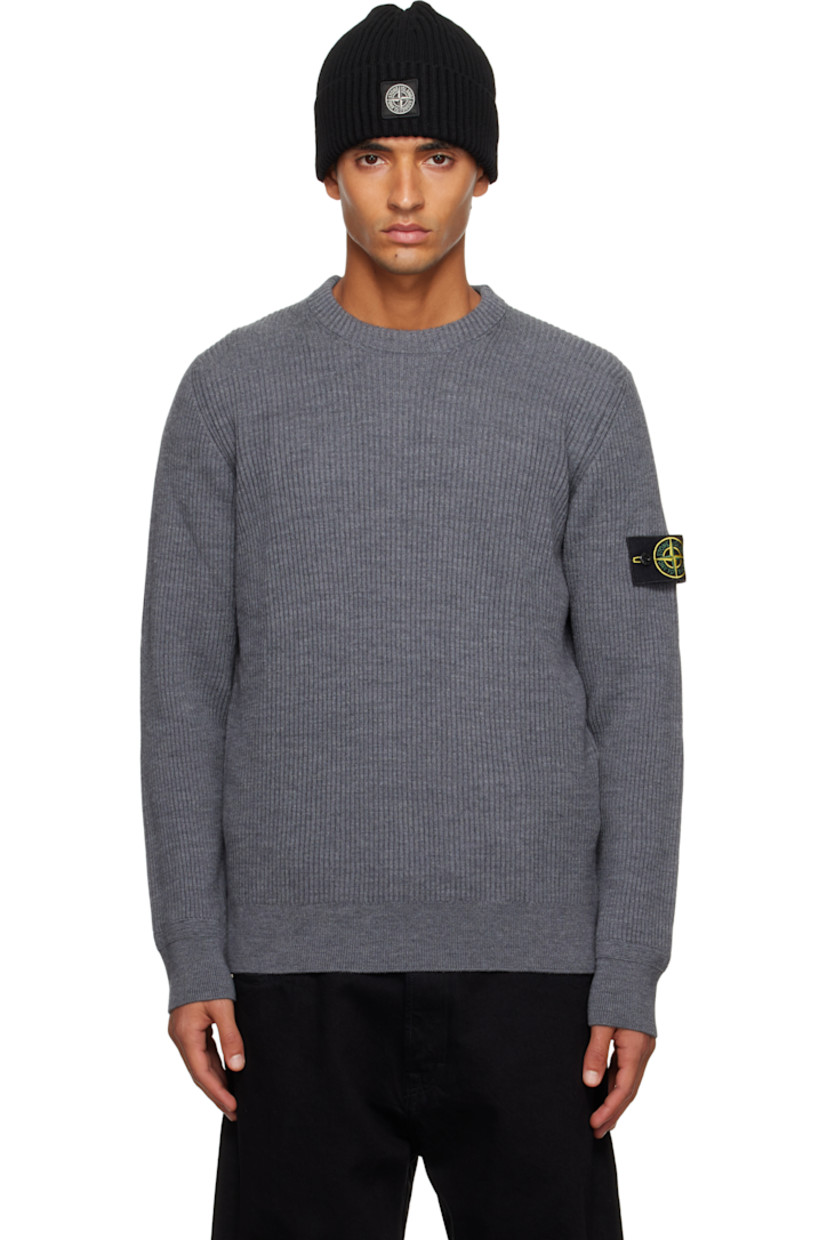 12-gauge rib-knit virgin wool sweater. 

· RWS-certified wool
· Crewneck
· Detachable felted logo patch at sleeve

Supplier color: Melange dark gray