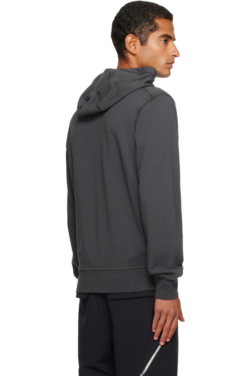 Organic cotton French terry hoodie.

· Garment-dyed
· Drawstring at hood
· Kangaroo pocket at waist
· Rib-knit hem and cuffs
· Detachable felted logo patch at sleeve

Supplier color: Lead grey