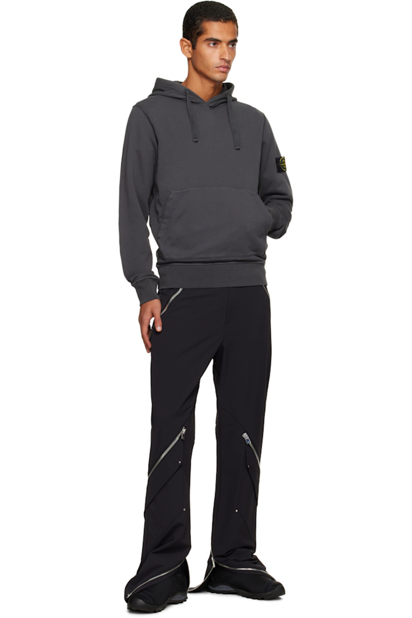 Organic cotton French terry hoodie.

· Garment-dyed
· Drawstring at hood
· Kangaroo pocket at waist
· Rib-knit hem and cuffs
· Detachable felted logo patch at sleeve

Supplier color: Lead grey