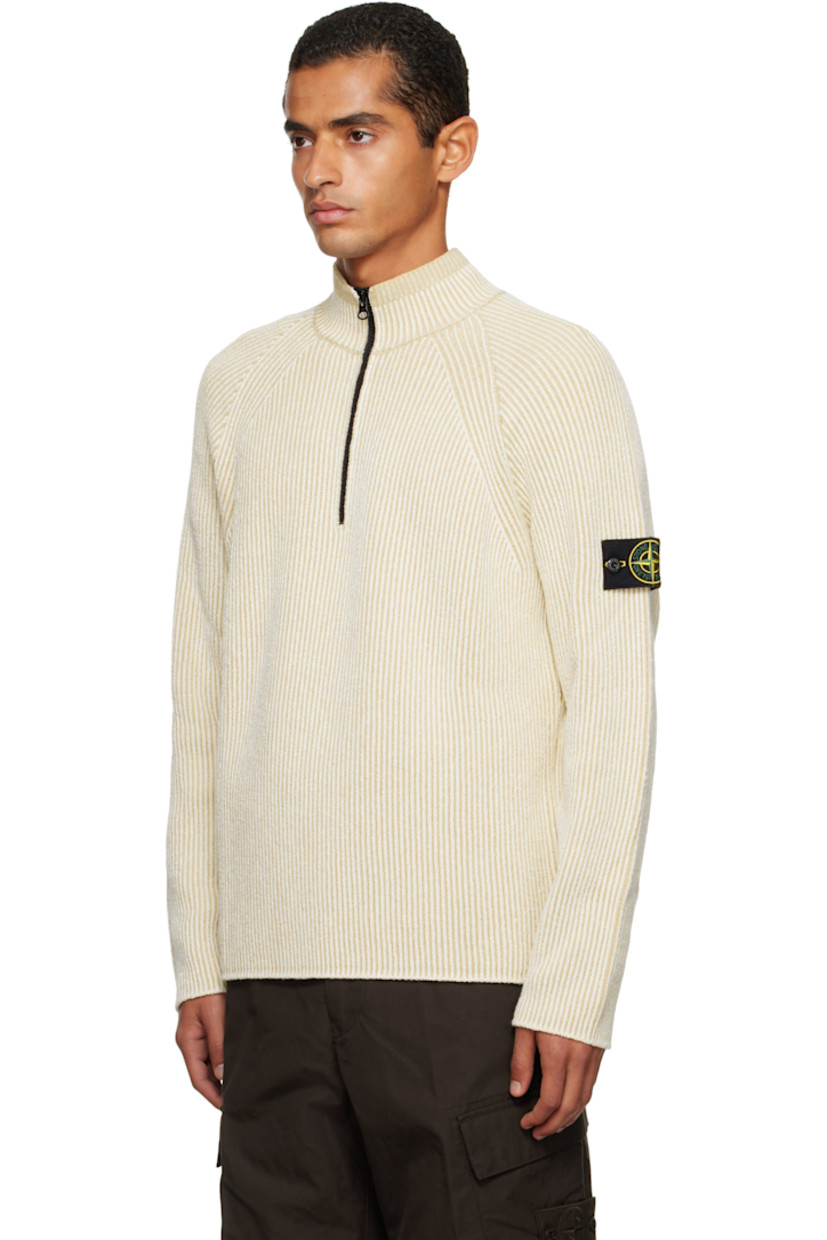 Rib-knit stretch virgin wool- and cotton-blend sweater.

· Stand collar
· Half-zip closure
· Raglan sleeves
· Detachable felted logo patch at sleeve

Supplier color: Ivory