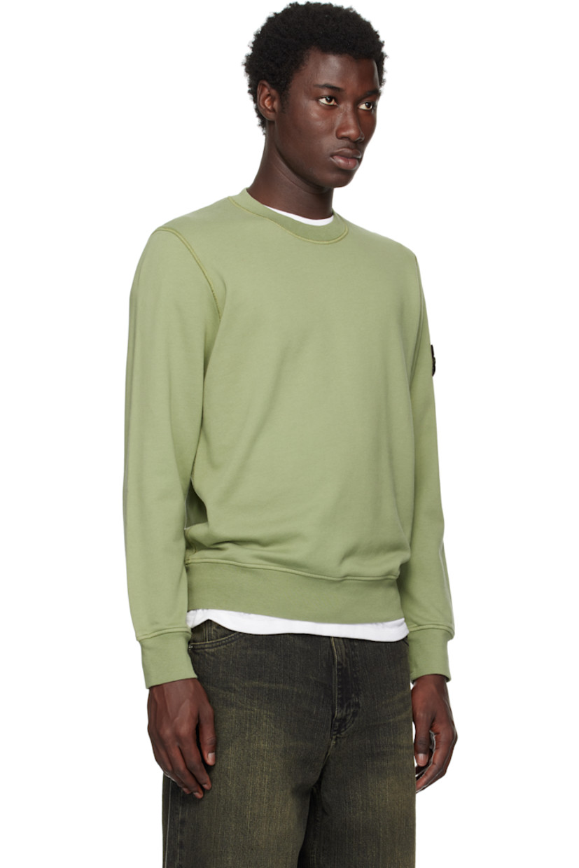 Garment-dyed organic cotton French terry sweatshirt.

· Rib-knit crewneck, cuffs, and hem
· Detachable felted logo patch at sleeve

Supplier color: Sage Green