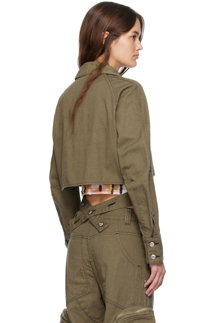 Non-stretch denim jacket. 

· Spread collar 
· Button closure 
· Wraparound straps with button fastening at hem 
· Cropped hem 
· Raglan sleeves 
· Buttoned barrel cuffs
· Contrast stitching in black

Supplier color: Earth